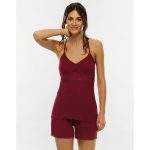 Pigiama donna in tessuto modal con pizzo e spalline incrociate.